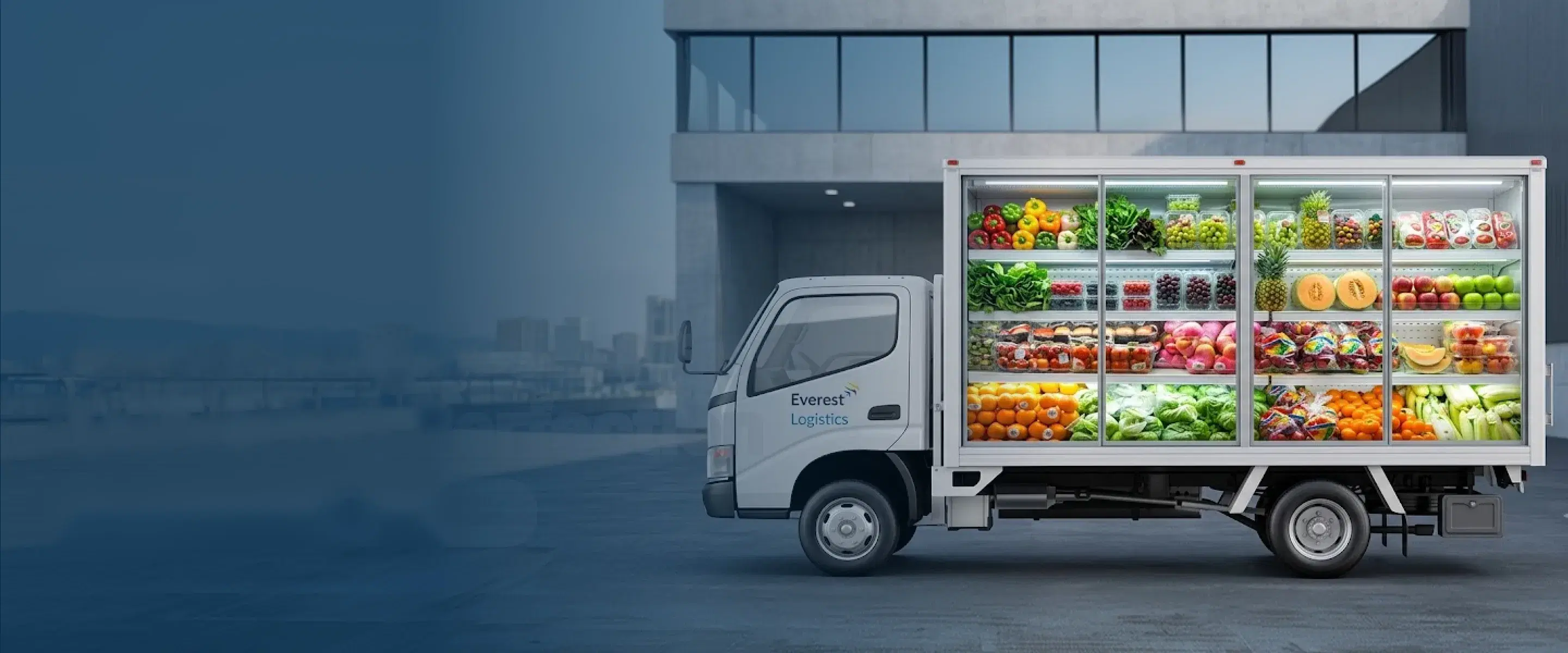 Everest Logistics refrigerated truck with shelves of fresh fruit and vegetables